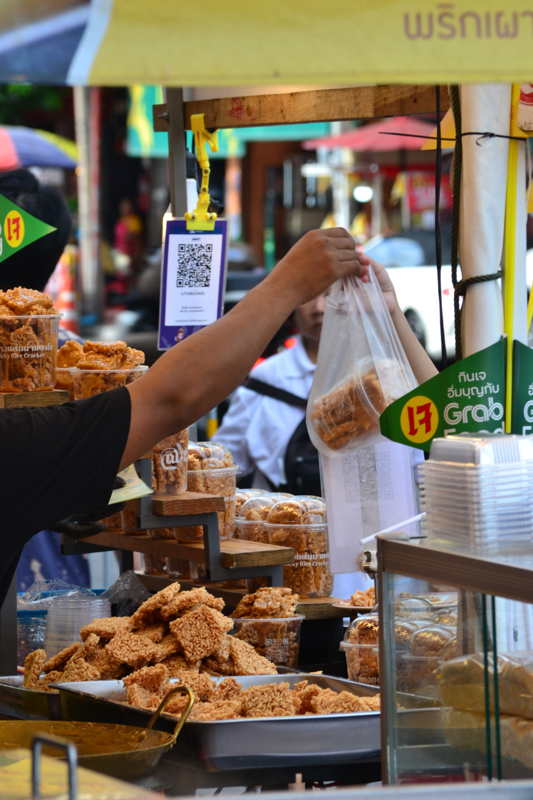 A street seller in Yaowarat Chinatown during the Vegetarian Festival in Bangkok